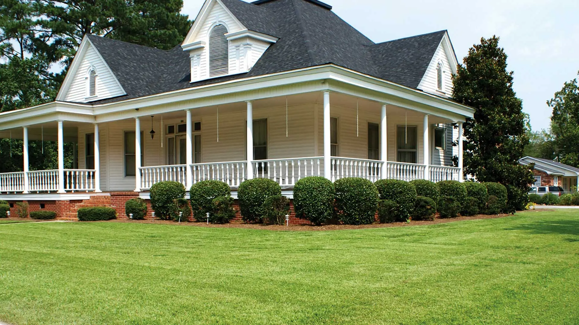 Home in Louisville, GA that we landscaped and provide lawn care.