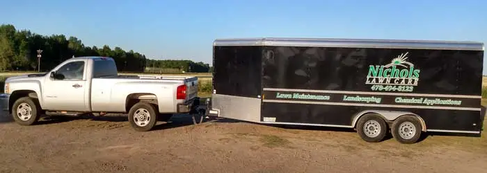 Nichols Lawn Care truck and trailer.